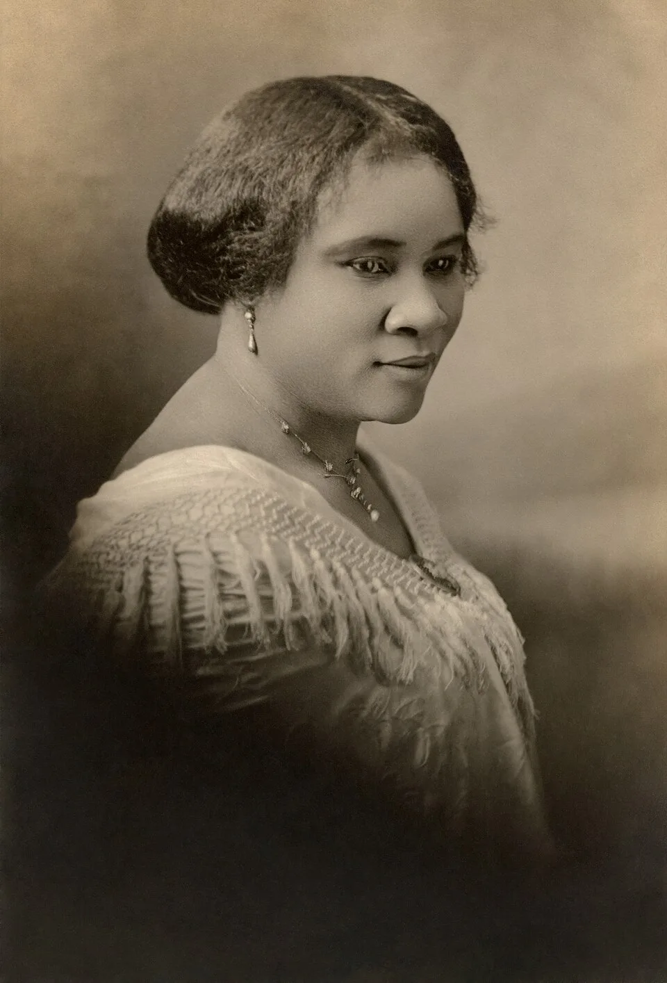 Sepia portrait of Madam C.J. Walker, about 1914